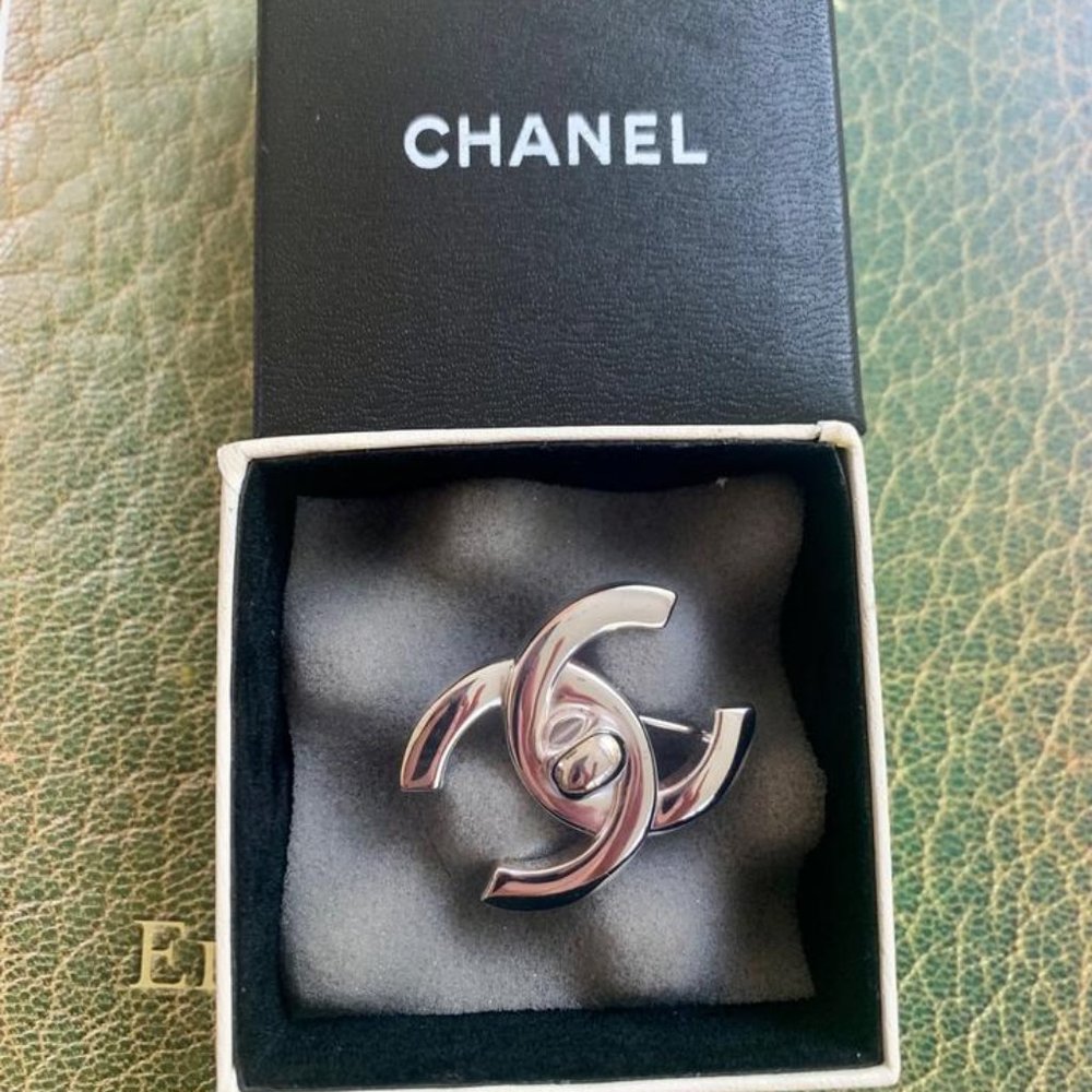 Chanel Silver Ultra Rare Cc Timeless Turnlock Pin